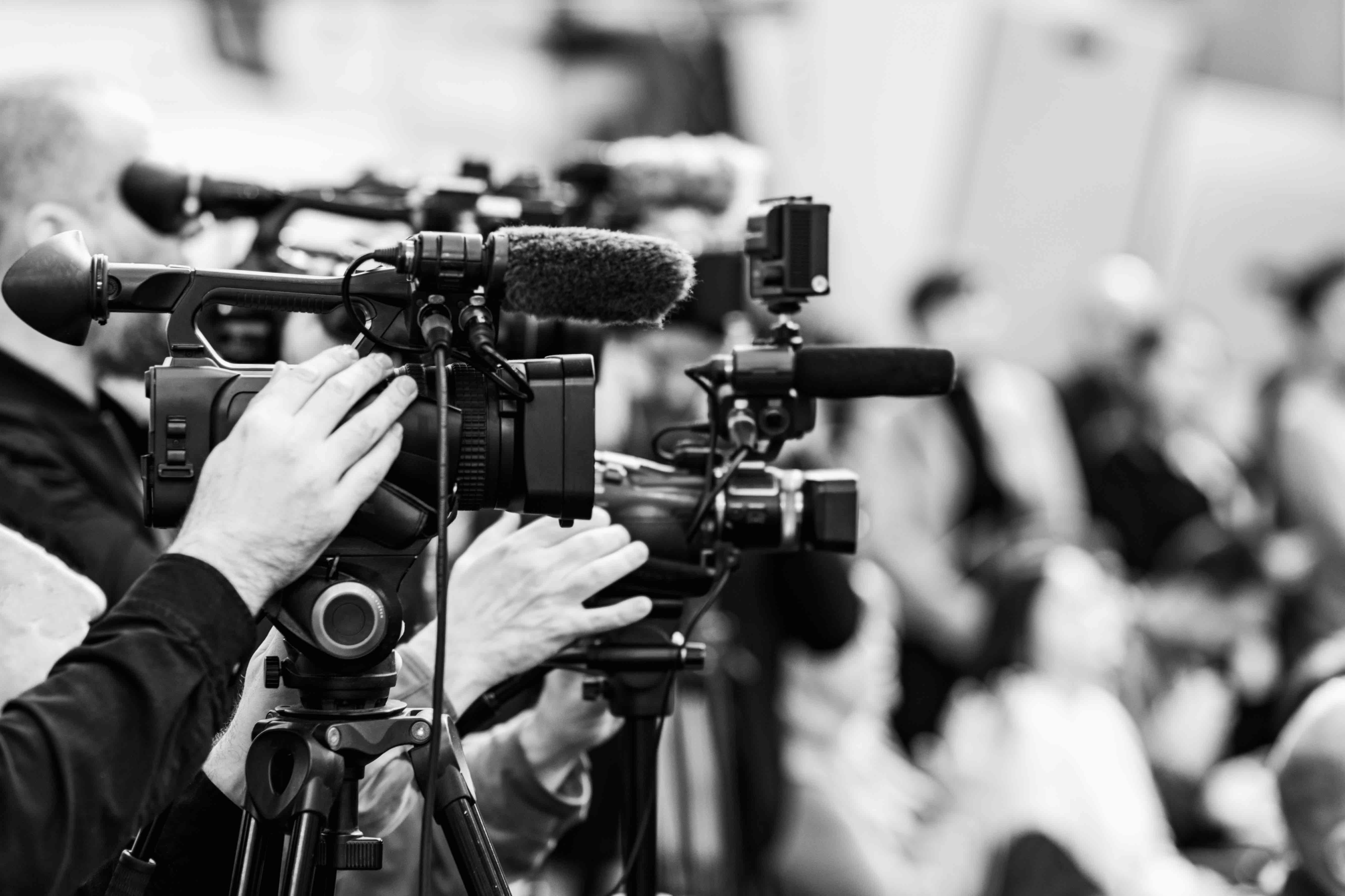 cameras-at-a-press-conference-
